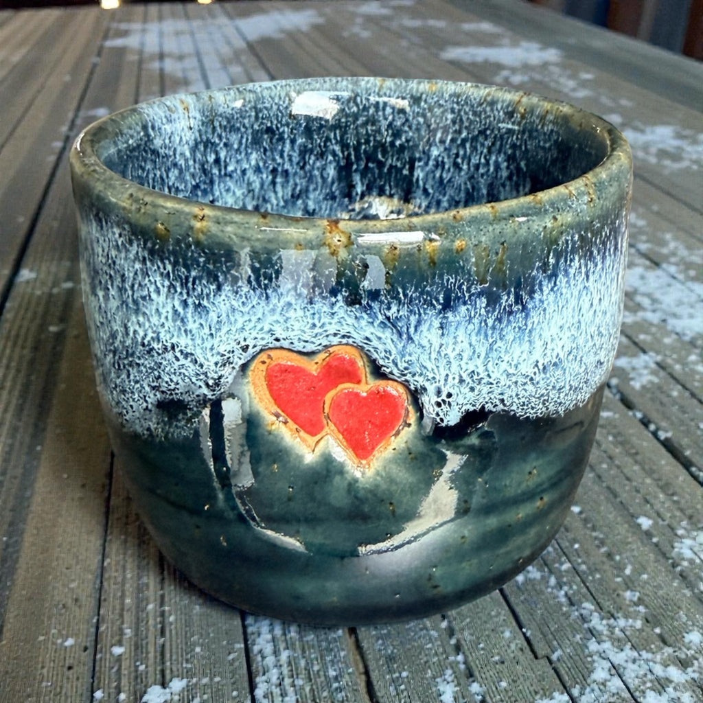 Handmade ceramic cup with hearts