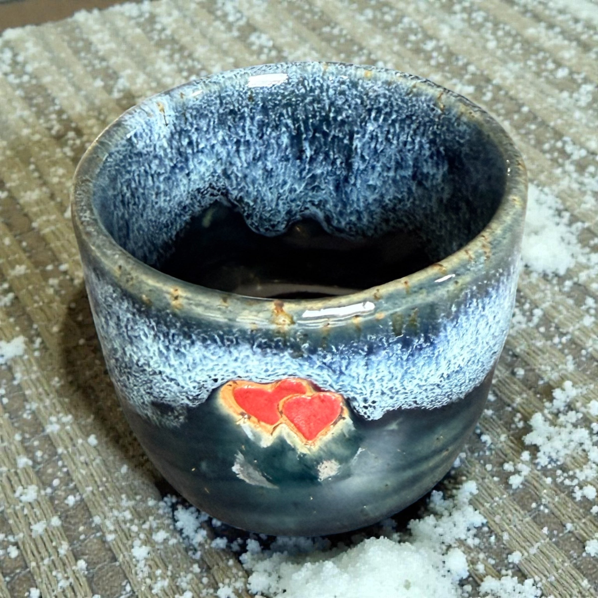 Handmade ceramic cup with hearts