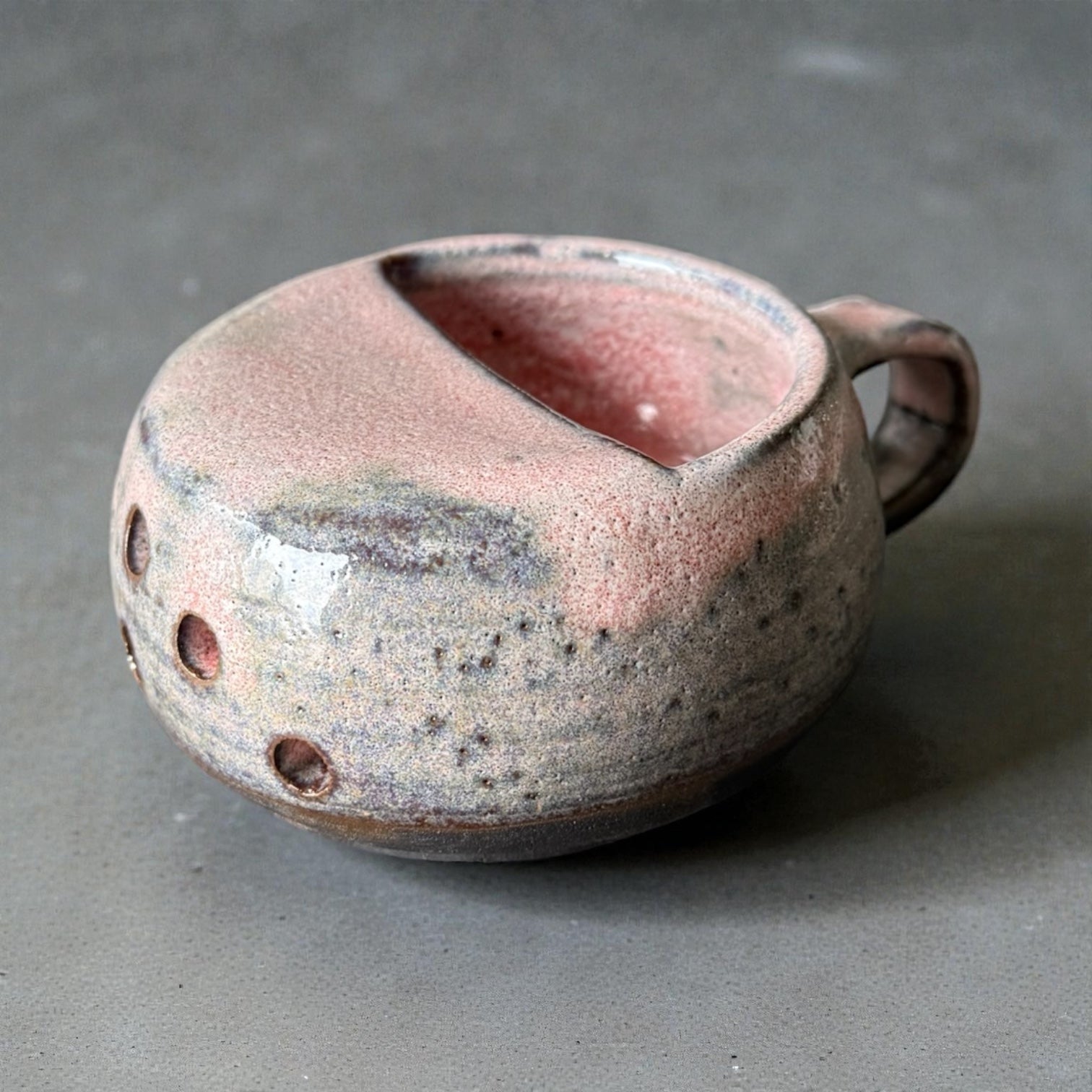 Handmade ceramic berry rinsing mug