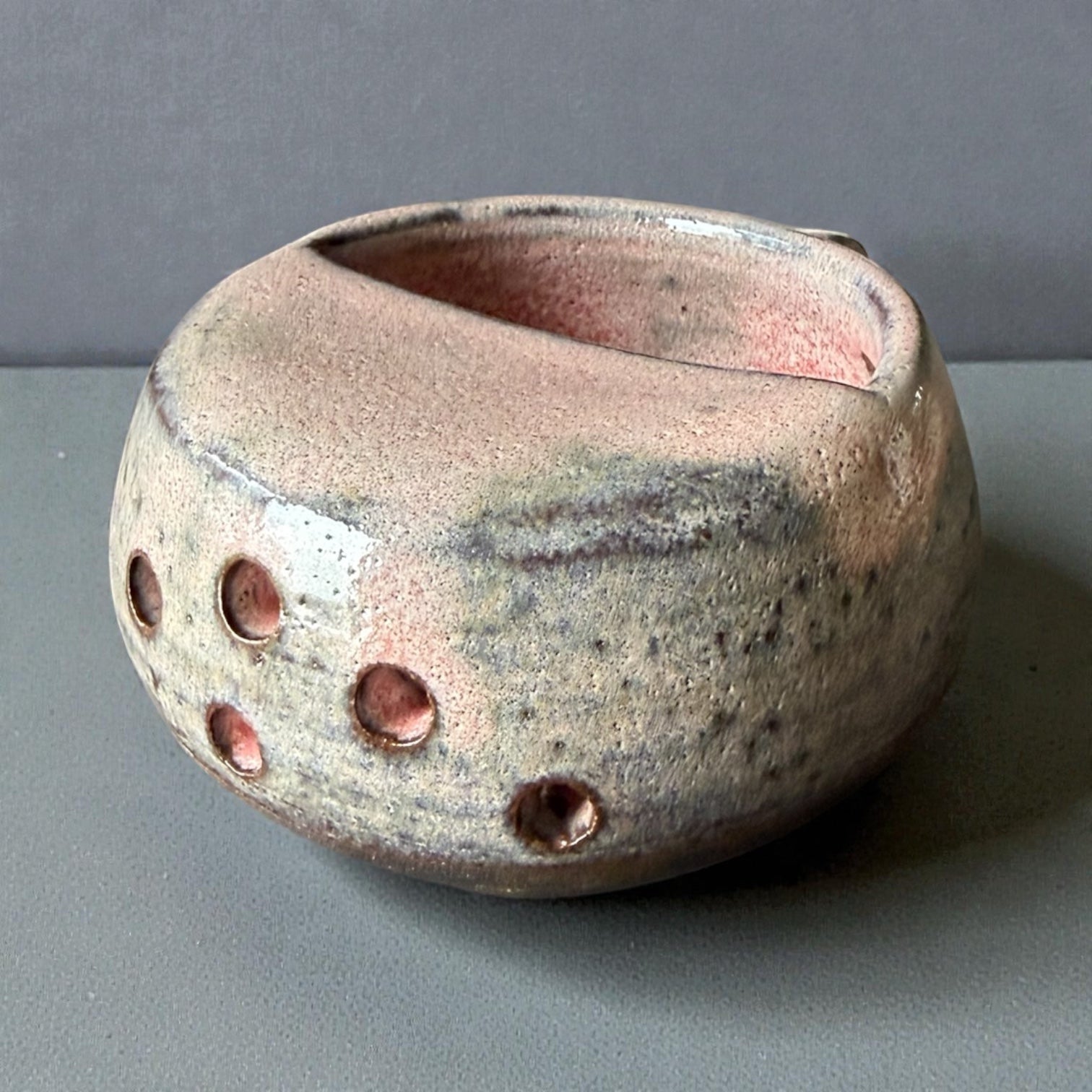 Handmade ceramic berry rinsing mug